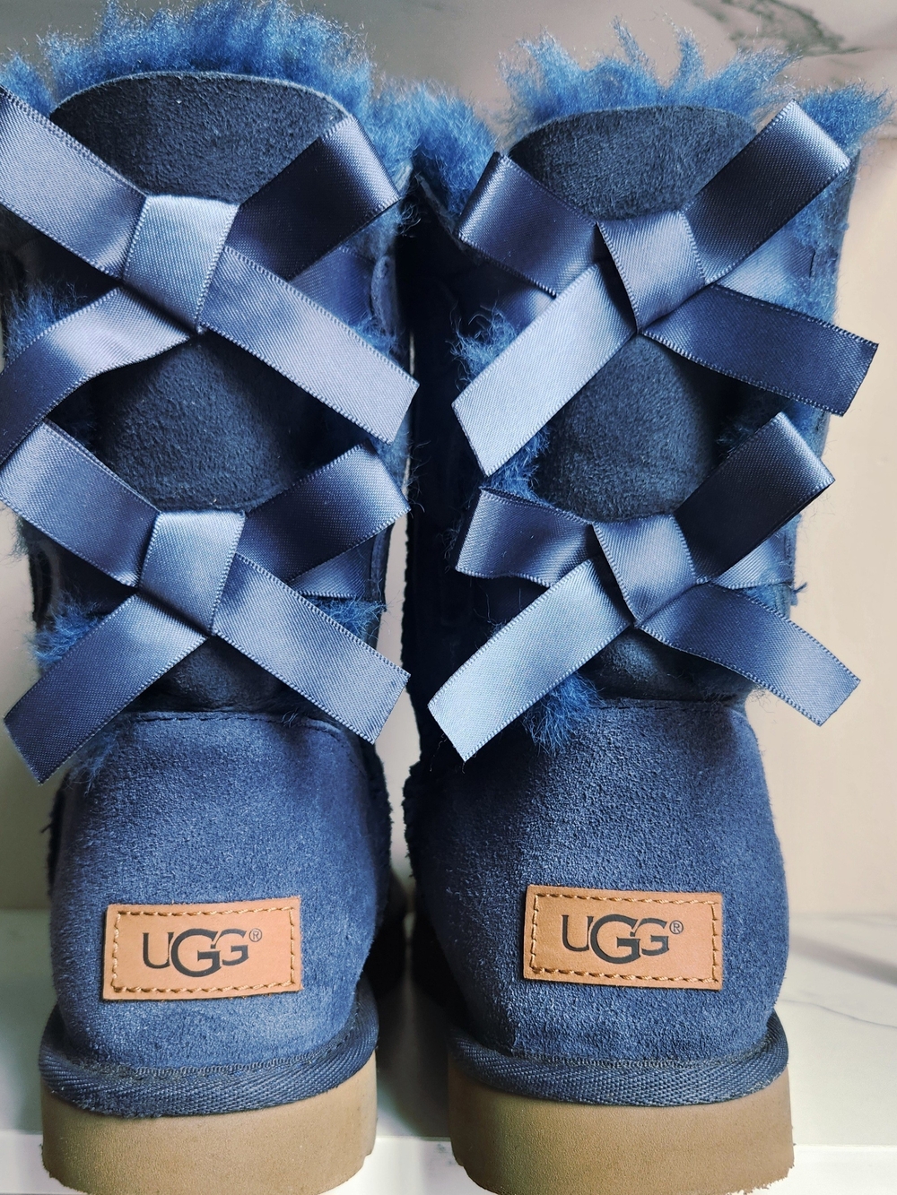 UGG Women's Navy Shearling Bow-Back Booties